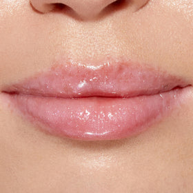 Too Faced Lip Injection Lip Gloss with strawberries background