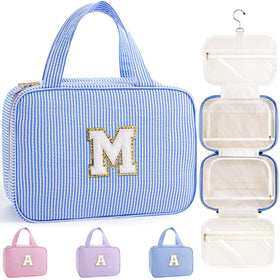 TOPEAST Travel Hanging Toiletry Bag in blue with initial patch front view