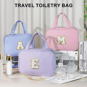 TOPEAST Travel Toiletry Bag in use in a bathroom setting