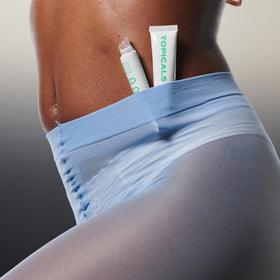Topicals Slick Salve Mint Lip Balm applied on lips