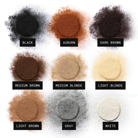 TOPPIK Hair Building Fibers Black 55g in use outdoors