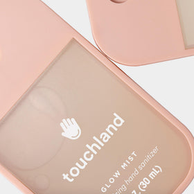 Touchland Glow Hand Sanitizer Spray lifestyle use on hands