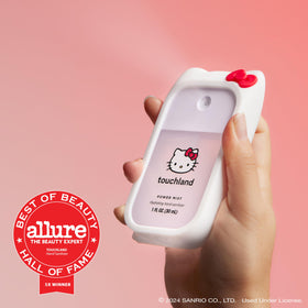 Touchland hand sanitizer Berry Bliss on a vanity