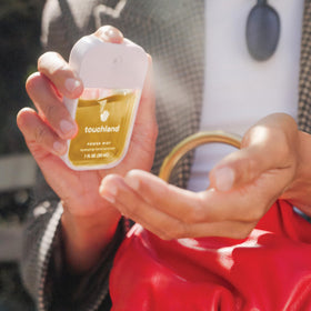 Touchland hand sanitizer ingredients list highlighting aloe vera and essential oils