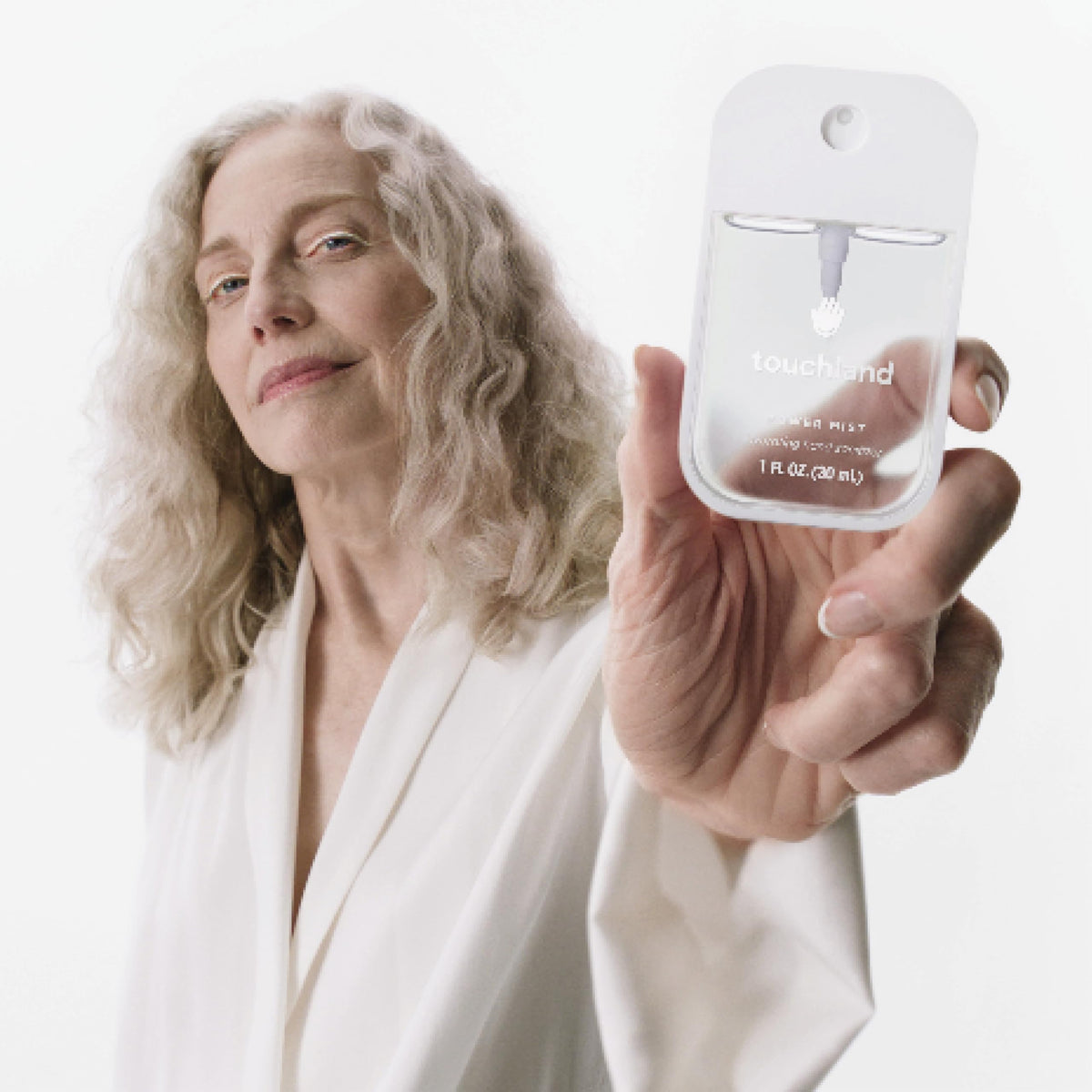 Touchland hand sanitizer trio set with a fresh background