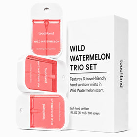 Touchland Wild Watermelon hand sanitizer spray in lifestyle setting