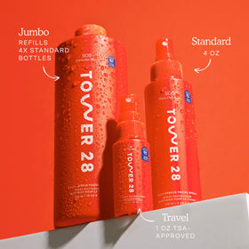 Tower 28 SOS Daily Rescue Spray on a bathroom counter