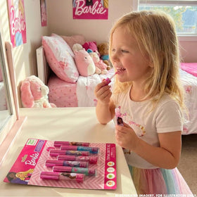 Townley Girl Barbie lip glosses displayed with fun character designs