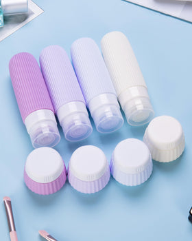 Transparent makeup bag holding Mrsdry Travel Bottles