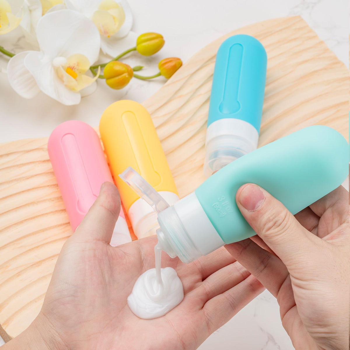 Travel toiletry container set with accessories like funnel and spoons