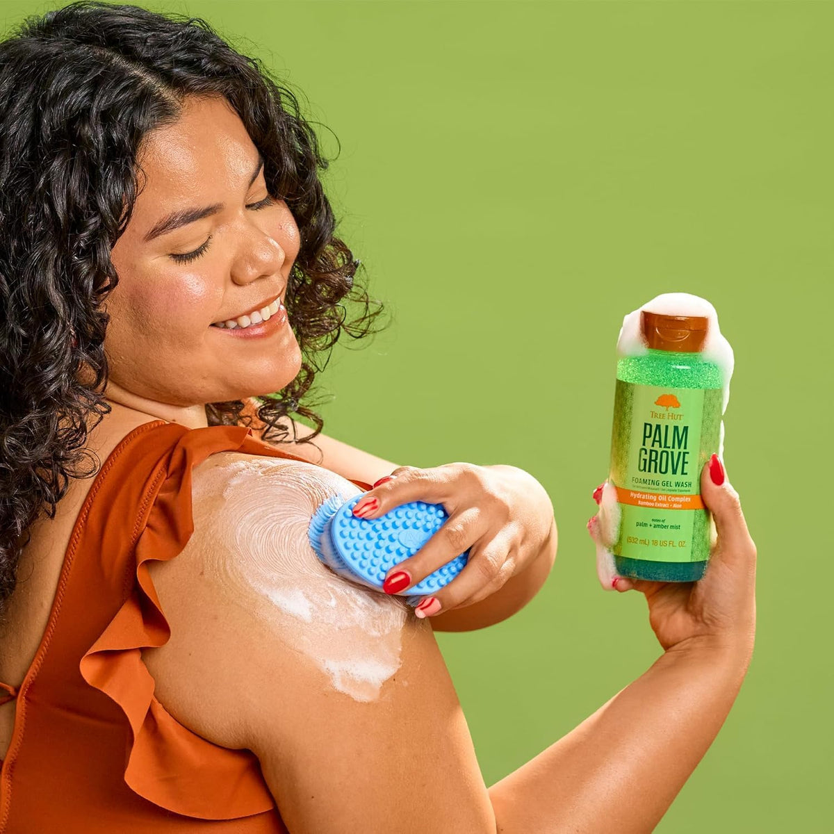 Tree Hut Body Wash Palm Grove 18 Fl Oz with lather on hands