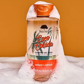 Tree Hut Coco Colada Foaming Gel Wash 18 Fl Oz in bathroom setting
