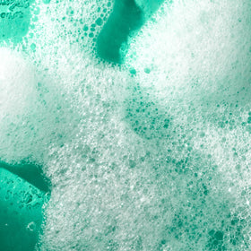 Tree Hut Merry Mint Foaming Gel Wash in a bathroom setting