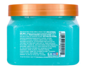 Tree Hut Shea Sugar Scrub Blue Lagoon in use on skin