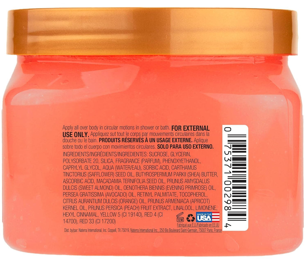 Tree Hut Shea Sugar Scrub Peach Sorbet 18 oz on a bathroom shelf
