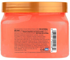Tree Hut Shea Sugar Scrub Peach Sorbet 18 oz on a bathroom shelf