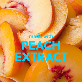 Tree Hut Shea Sugar Scrub Peach Sorbet in a spa setting