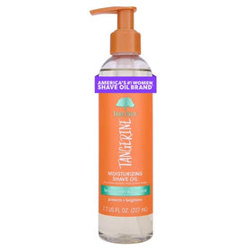 Tree Hut Tangerine Shave Oil bottle with citrus fruits