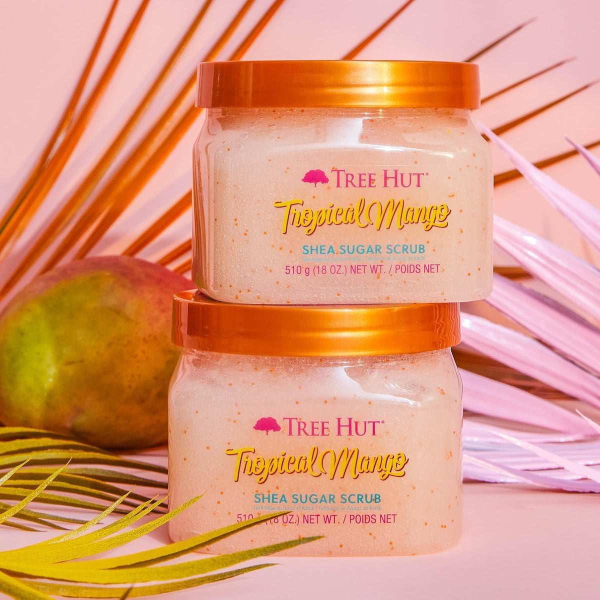 Tree Hut Tropical Mango Body Scrub 18 Oz in a bathroom setting