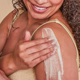 Tree Hut Vanilla Body Scrub on a shower shelf