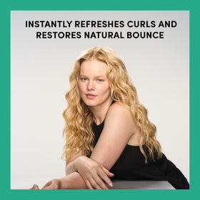 TRESemmé Bouncy Curls Leave-In Refresher 6.7 fl oz with curly hair close-up