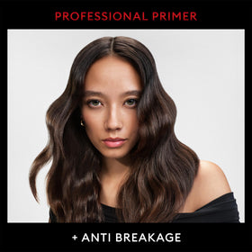 TRESemmé Heat Protectant Spray application on hair