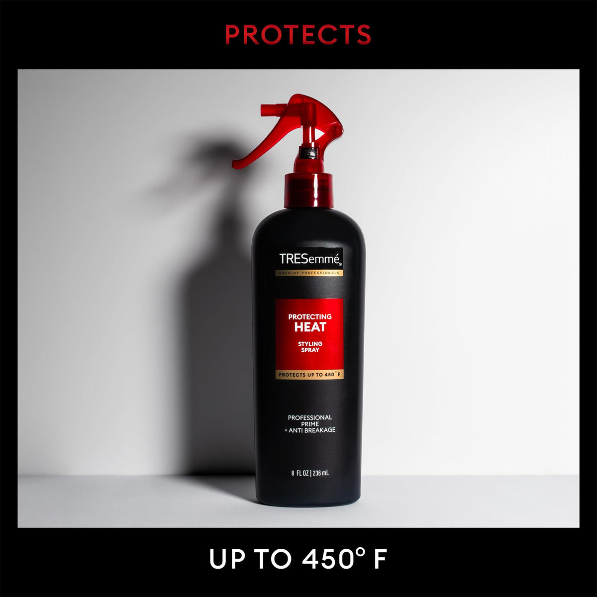 TRESemmé Heat Protectant Spray in bathroom setting