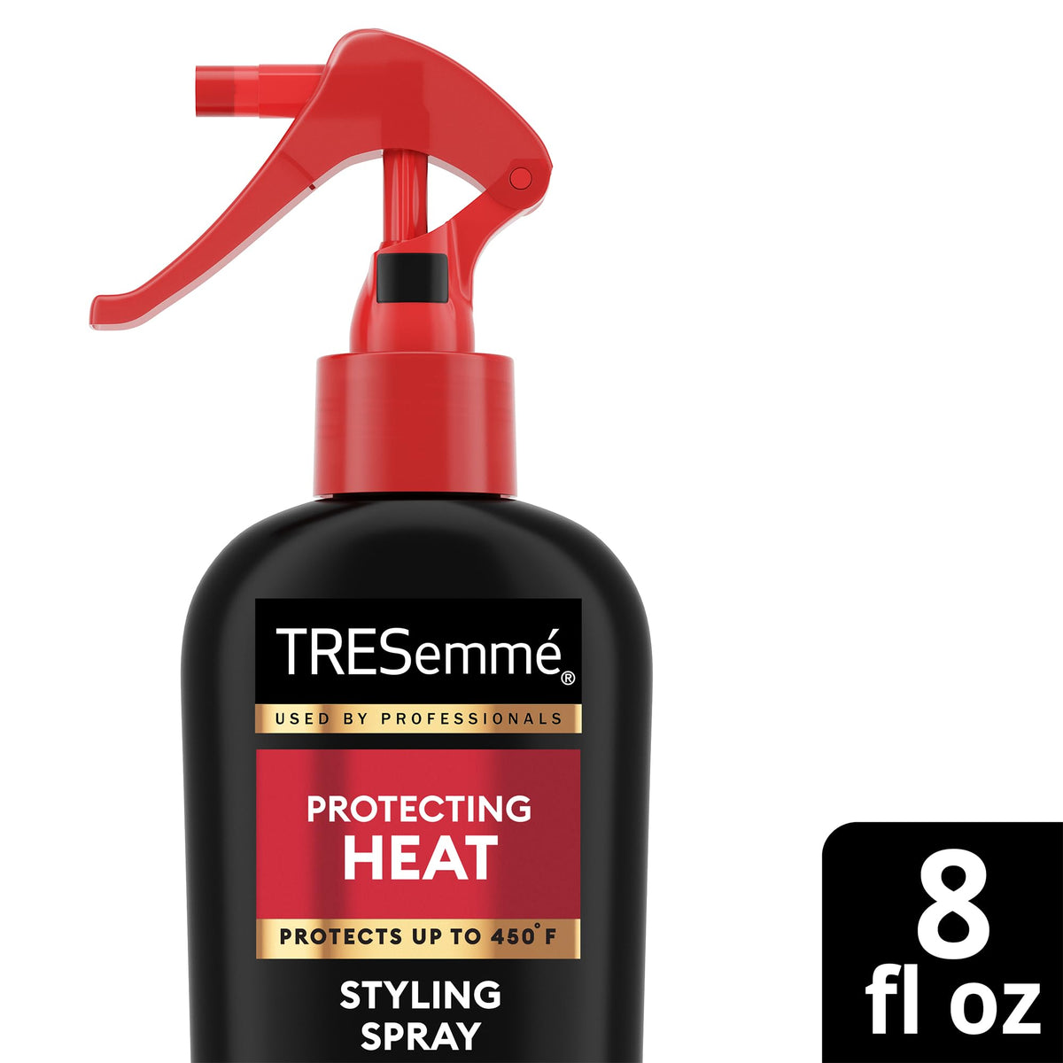 TRESemmé Heat Protectant Spray on vanity with hairbrush
