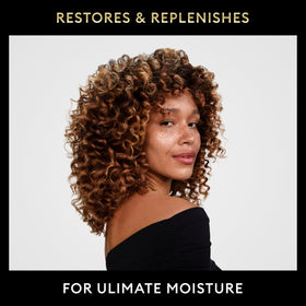 TRESemmé Protecting Heat Styling Spray next to shampoo
