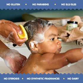 TUBBY TODD silicone brush in use on baby's head
