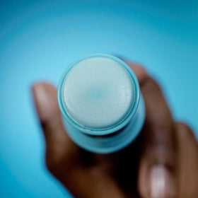 TULA Eye Balm Glow & Get It applied under the eye