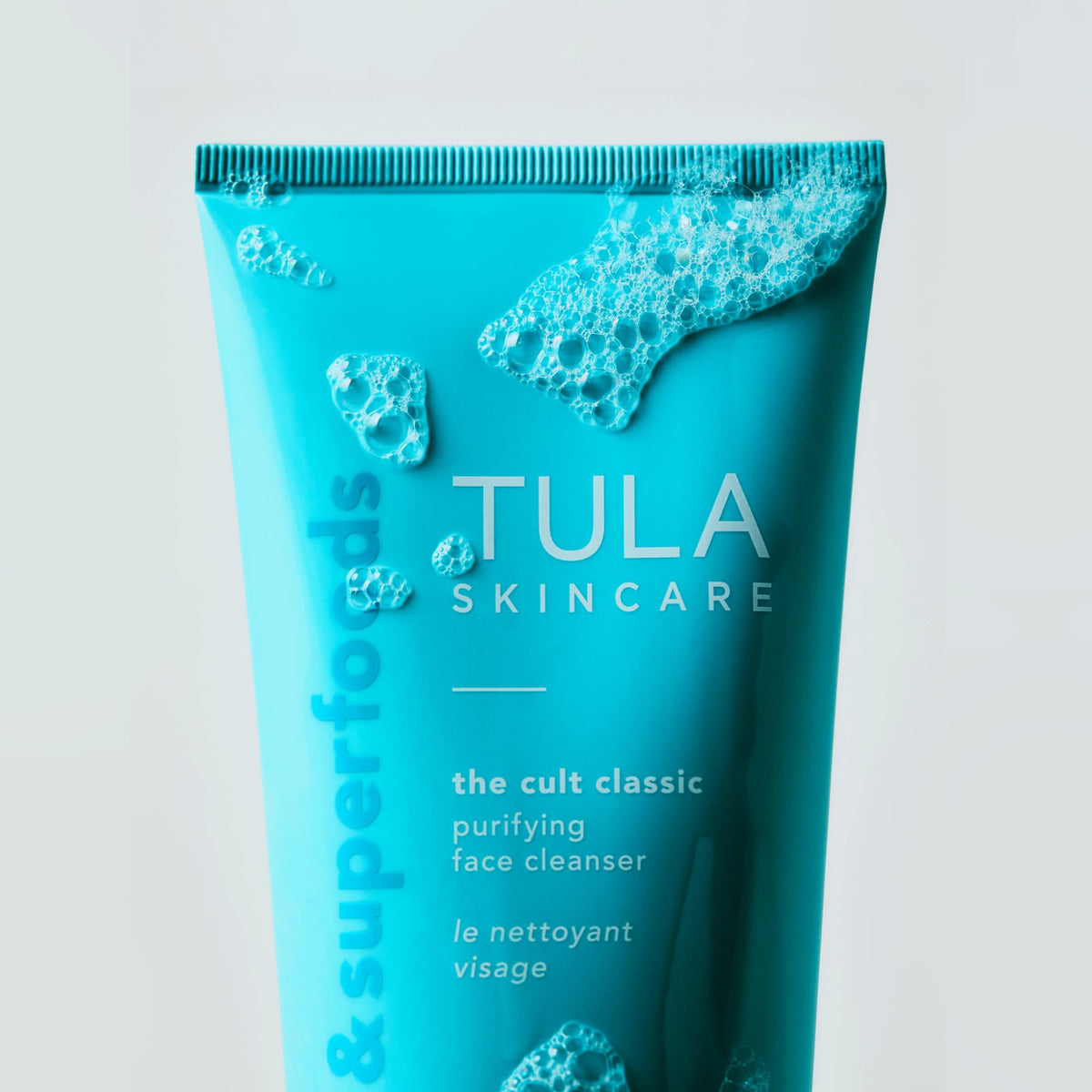 TULA Skin Care Purifying Face Cleanser Duo in bathroom setting