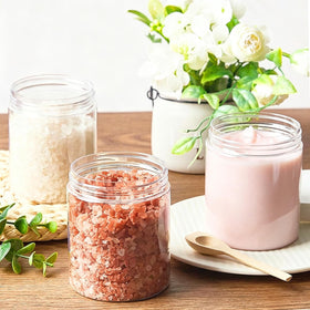 TUZAZO 8 oz plastic container in a travel kit