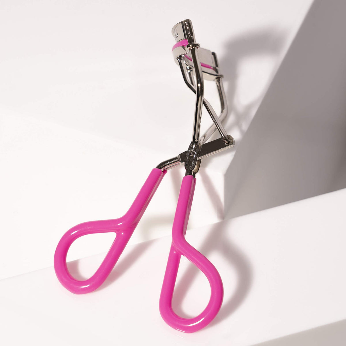 Tweezerman eyelash curler with silicone pads close-up