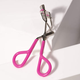 Tweezerman eyelash curler with silicone pads close-up