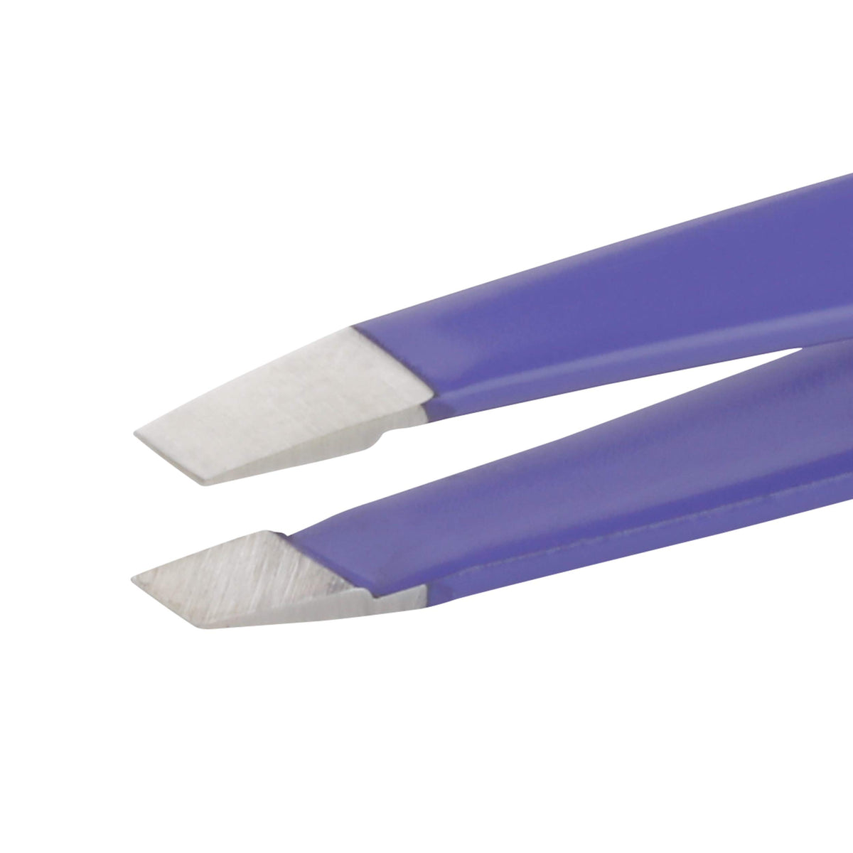 Tweezerman Mini Slant Tweezer displayed on a vanity