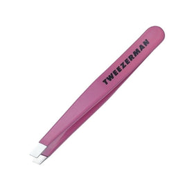 Tweezerman Mini Slant Tweezer in hand demonstrating use