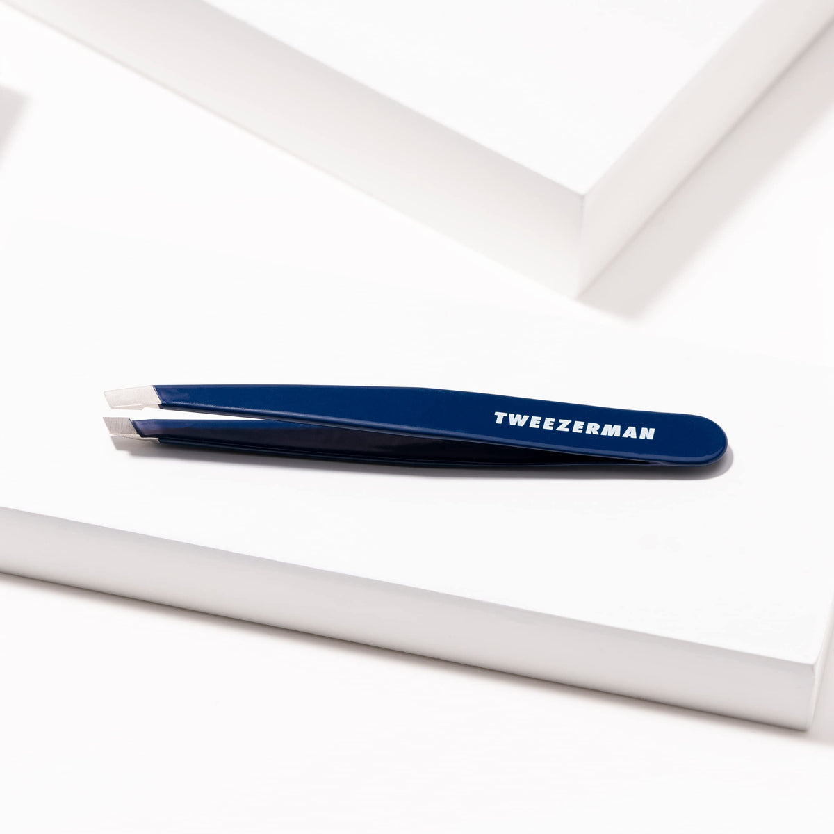 Tweezerman Slant Tweezer Evening Blue with brow hair removal