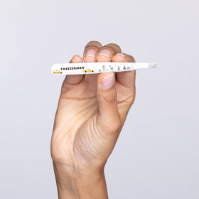 Tweezerman Slant Tweezer in a beauty routine setting