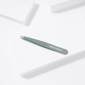 Tweezerman Slant Tweezer Mist Blue in hand