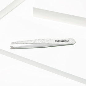 Tweezerman Slant Tweezer on a beauty table