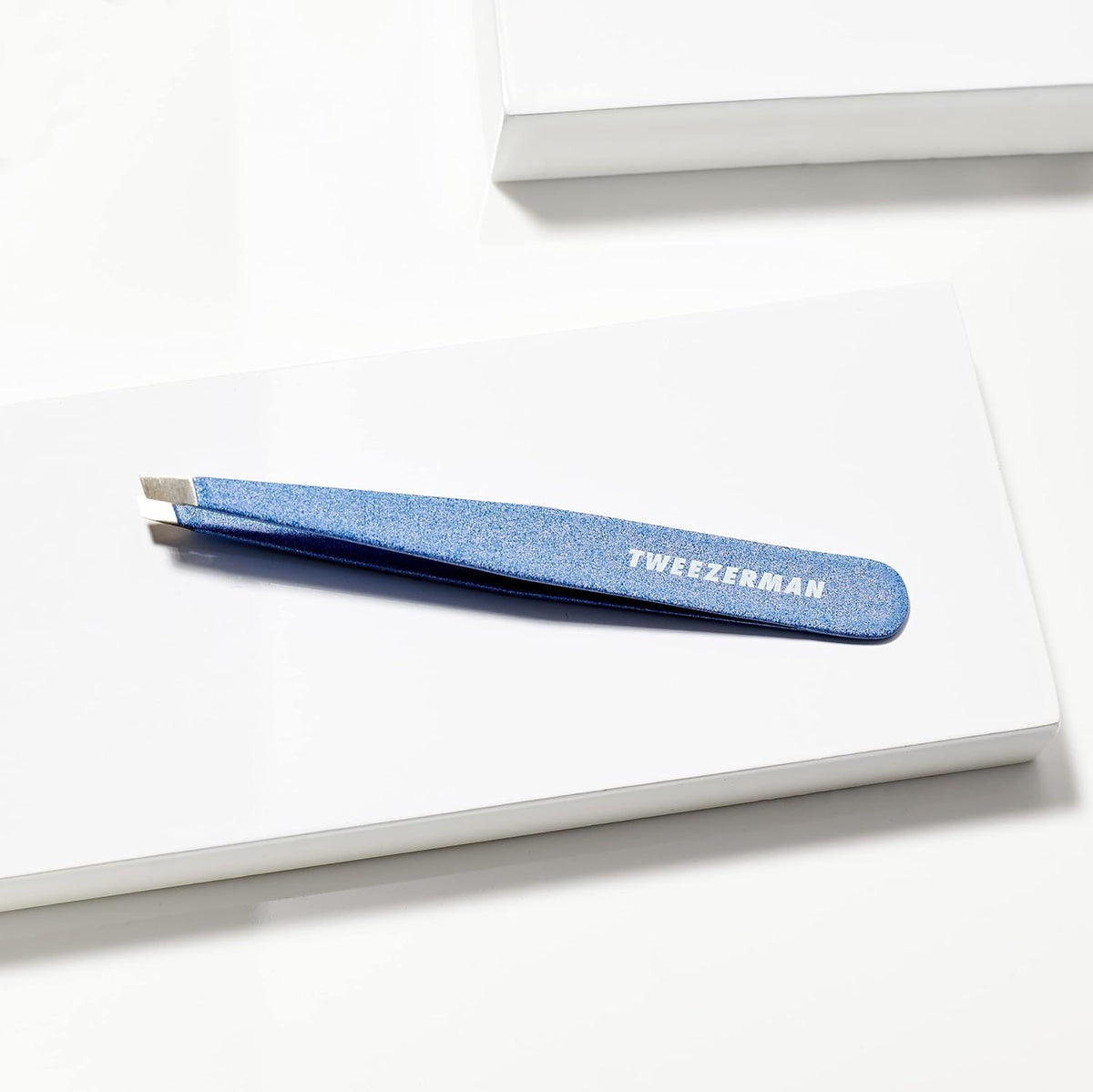 Tweezerman Slant Tweezer on a vanity table