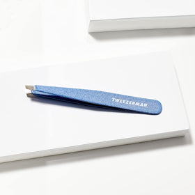 Tweezerman Slant Tweezer on a vanity table