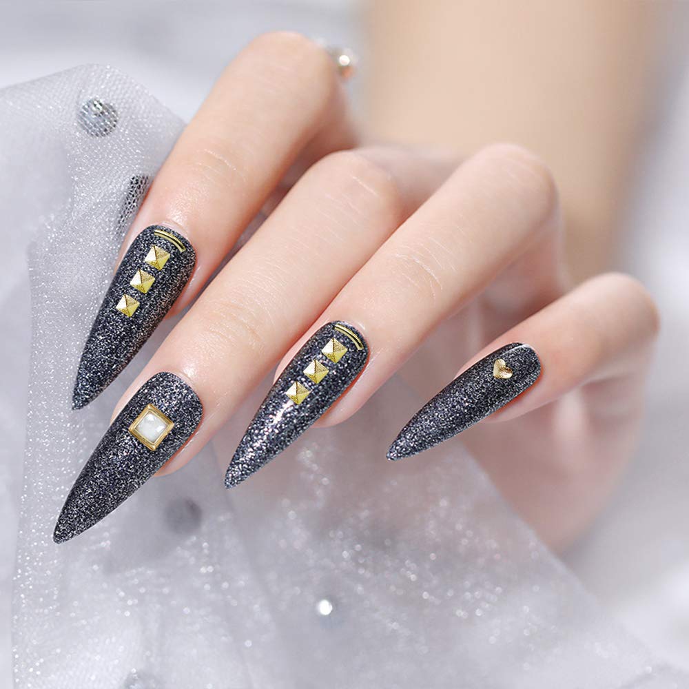 Tweezers and pens included in Artdone Nail Rhinestones Kit