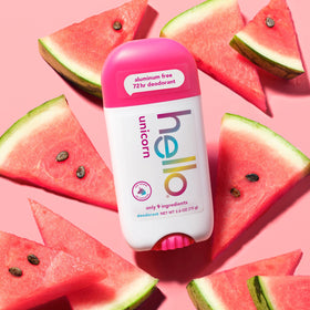 two hello Unicorn Deodorants with a fruity background