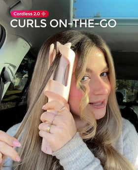 TYMO CURLGO curling iron in use creating beach waves