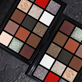 UCANBE Eyeshadow Palette on a makeup vanity with brushes