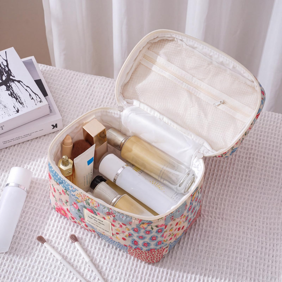 uekeboag Large Floral Cotton Makeup Bag displayed with beauty products