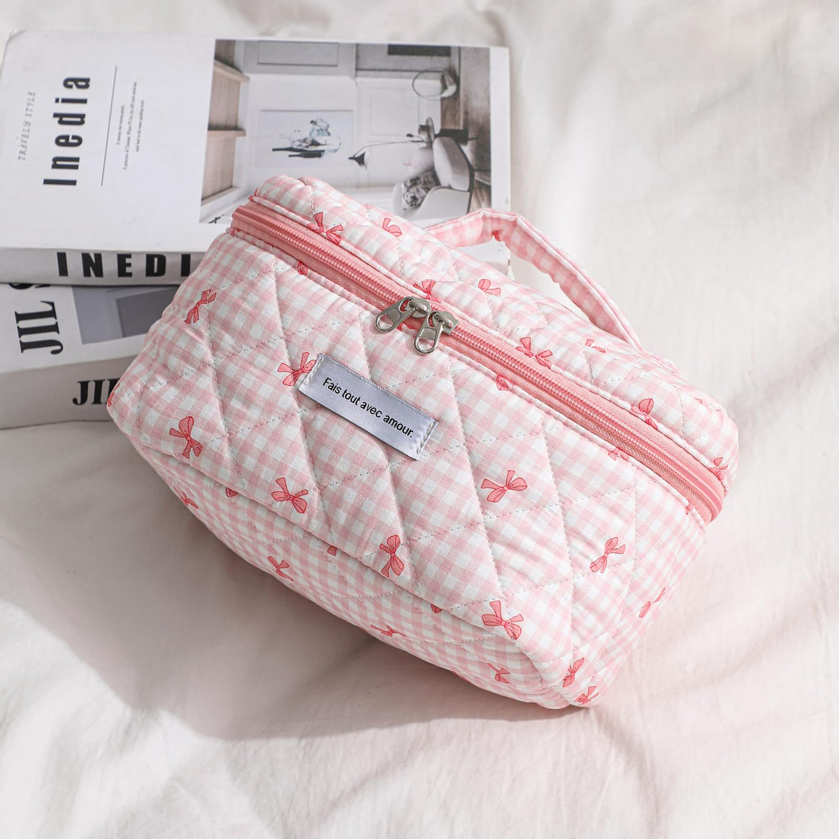 uekeboag Large Travel Quilted Makeup Bag opened with cosmetics inside