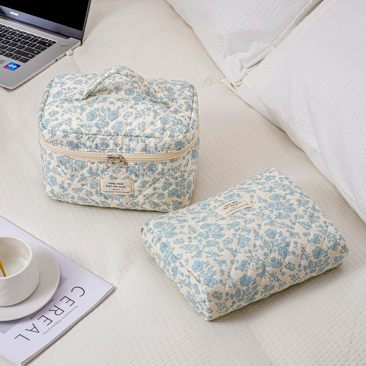 uekeboag large travel quilted makeup bag set displayed with cosmetics
